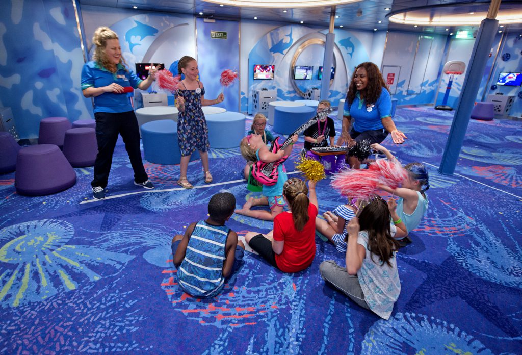 Young cruisers rock out with youth counselors in Camp Ocean aboard the Carnival Sunrise